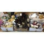 A box containing a collection of various Teddy Bear Orphanage bears together with various blankets