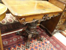 A Victorian rosewood fold over card table,