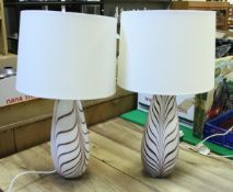 A pair of Nailsea glass table lamps