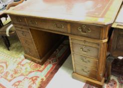 A 20th Century mahogany kneehole desk in the Georgian style