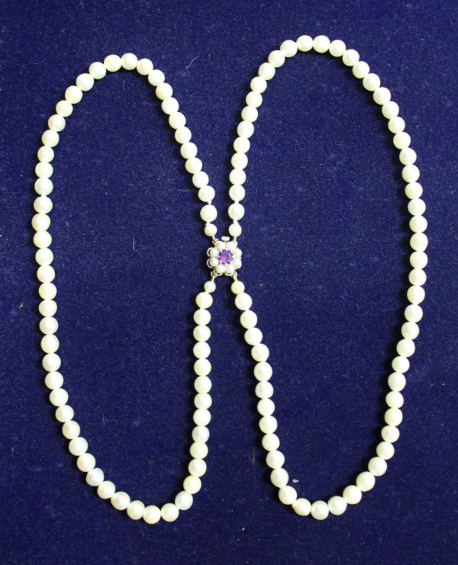 Double strand cultured pearl necklace with 9ct gold mounted amethyst and pearl clasp length 16