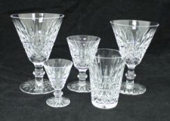 A part suite of Waterford cut glass drinking glasses including three red wines, seven white wines,