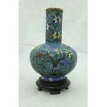 A Chinese cloisonné vase with floral decoration on a turquoise ground,