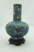 A Chinese cloisonné vase with floral decoration on a turquoise ground,