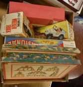 A box of various toys including Marx Hill-climbing jeep, boxed, Marx Hill-climbing wrecker truck,