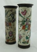 A pair of circa 1900 Japanese satsuma cylindrical vases with flared rims,
