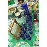 A Bohemian blue overlaid cut glass lemonade set of jug and six glasses,