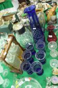 A Bohemian blue overlaid cut glass lemonade set of jug and six glasses,