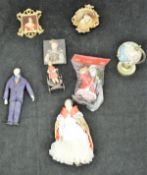 A box containing a quantity of various dolls' house furniture and decorations, glass ware, china,