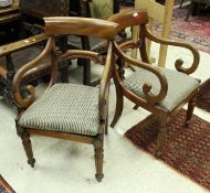 A pair of Victorian elbow chairs,