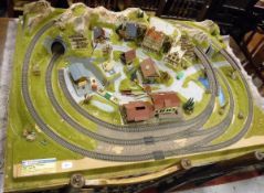 A Noch Modellbahn HO gauge railway layout with buildings,