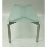 A Bulo H²O glass topped metal framed dining table designed by Claire Bataille and Paul Ibens,