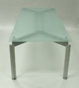 A Bulo H²O glass topped metal framed dining table designed by Claire Bataille and Paul Ibens,