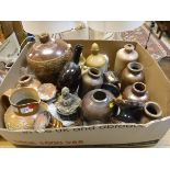 A collection of 17 various stoneware jars,