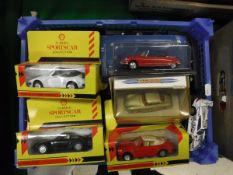 A collection of various Porsche model cars including Dinky 1958 356A Coupé,