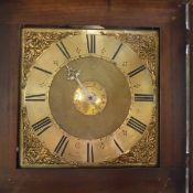 A late 18th Century oak cased long case clock of slim proportions,