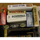 A box and quantity of various games including "Game of Life" "Sorry!" "Downfall" "Reminiscing"
