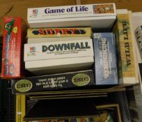 A box and quantity of various games including "Game of Life" "Sorry!" "Downfall" "Reminiscing"