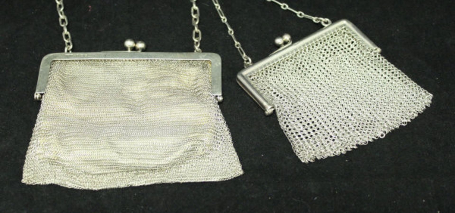 Two silver mounted chainmail purses / evening bags (the larger with shammy leather lining)