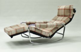 A circa 1970 "Condor" chrome framed and upholstered rocking armchair with replacement fawn,