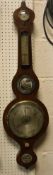 A 19th Century mahogany cased banjo barometer inscribed J Saldarini,