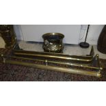 A 19th Century embossed brass baluster shaped jardinier in the Dutch style with brass lion mask