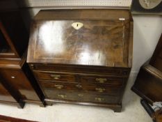 An early 18th Century walnut bureau,