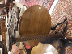 An early 19th Century mahogany tea table,