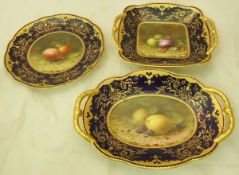 A Coalport part dessert service with the centre fields with fruit decoration by Frederick H Chivers