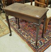 A George III mahogany side table the single piece top on cabriole legs to pad feet