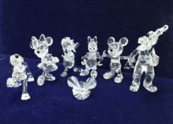 A Swarovski Walt Disney showcase collection including Mickey, Minnie, Donald, Daisy,