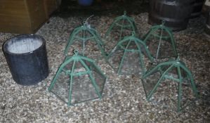 A set of six painted aluminium framed cloches together with a carved marble cylindrical jardinere