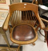 An American oak comb back swivel office chair