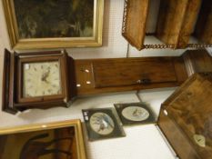 A 19th Century stained pine and elm long cased clock,