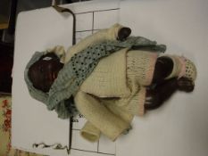 An Armand Marseille black baby bisque headed doll, No. 351./4.K.