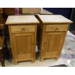 Two pairs of pine pot cupboards