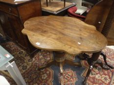 A Victorian walnut centre table,