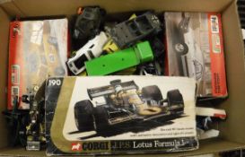 A box of various model vehicles including Corgi JPS Lotus formula 1 190,