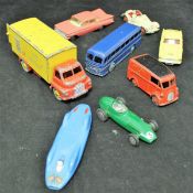 A collection of various die-cast vehicles including Dinky Toys Jaguar (157), Austin Healey (109),