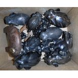 A collection of twelve ebony / ebonised elephant ornaments and six other various elephant figures