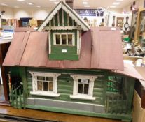 A painted wooden scratch built dolls house