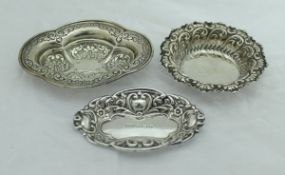 A Victorian silver shaped oval and embossed trinket dish London 1886 by Edgar Finley and Hugh