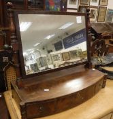 An early 19th mahogany toilet mirror with bow fronted three drawer base together with a 19th