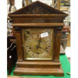 A late 19th Century oak cased mantle clock,