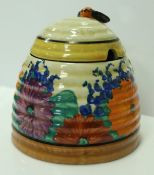 A Clarice Cliff "Bizarre" "Gay Day" honey pot and cover CONDITION REPORTS Light