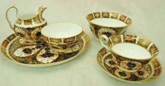 A Royal Crown Derby Japan pattern twelve place tea service with cups, saucers, plates,