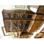 A 20th Century mahogany breakfront bookcase of small proportions in the George III taste,