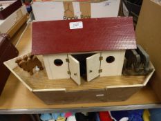 A scratch-built painted wooden Noah's Ark and collection of various animals