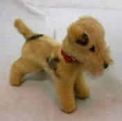 A Steiff style fox terrier with black and white plush wood wool filled