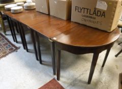 A Regency mahogany D end dining table with three leaves all on squared tapering legs together with